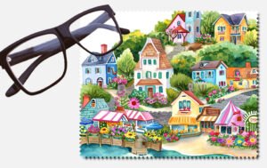 A beautiful colourful small town beside an ocean lens cleaning cloth