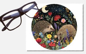 Two hedgehogs by the light of a crescent moon with lots of flowers lens cleaning cloth